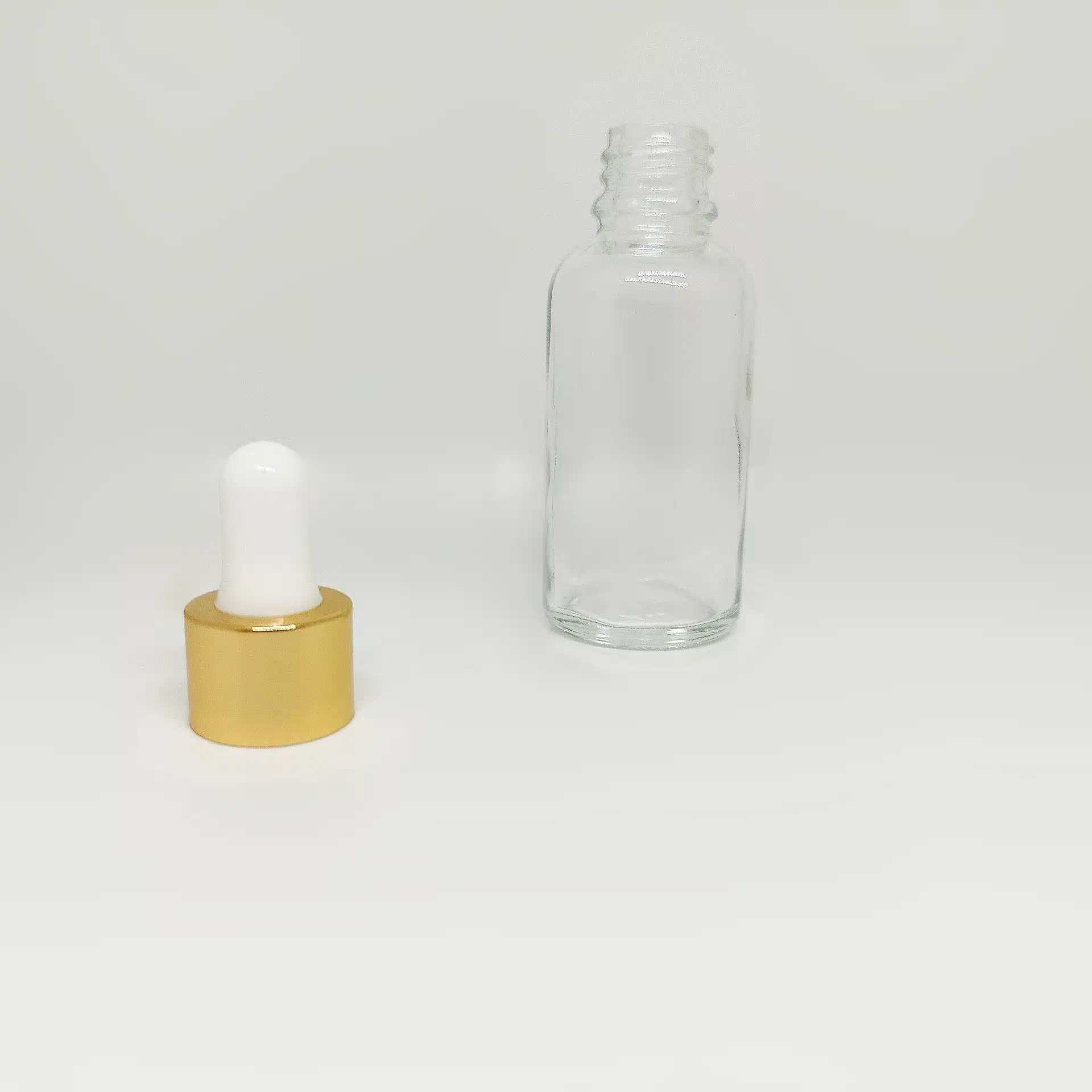 شیشه قطره ۳۰ شفاف با قطره چکان سفید طلایی وارداتی و میله قطره - Image 2