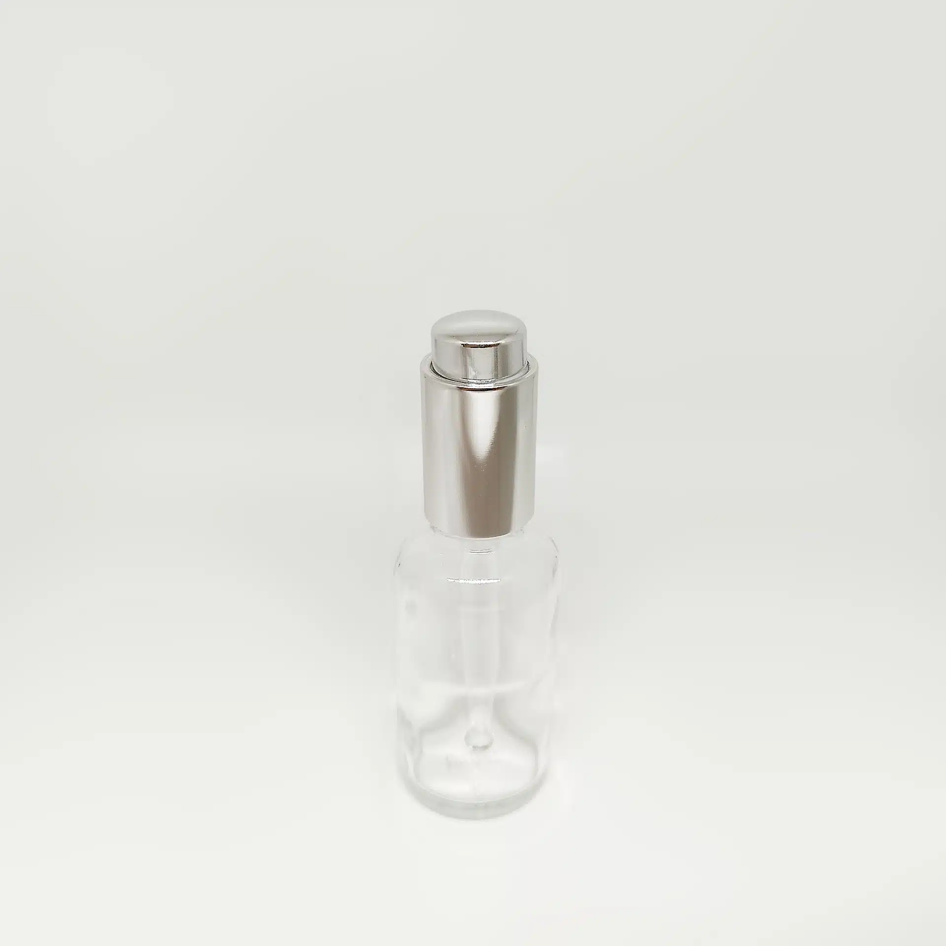 شیشه قطره ۳۰ میل شفاف با قطره چکان دکمه ای کروم وارداتی - Image 2