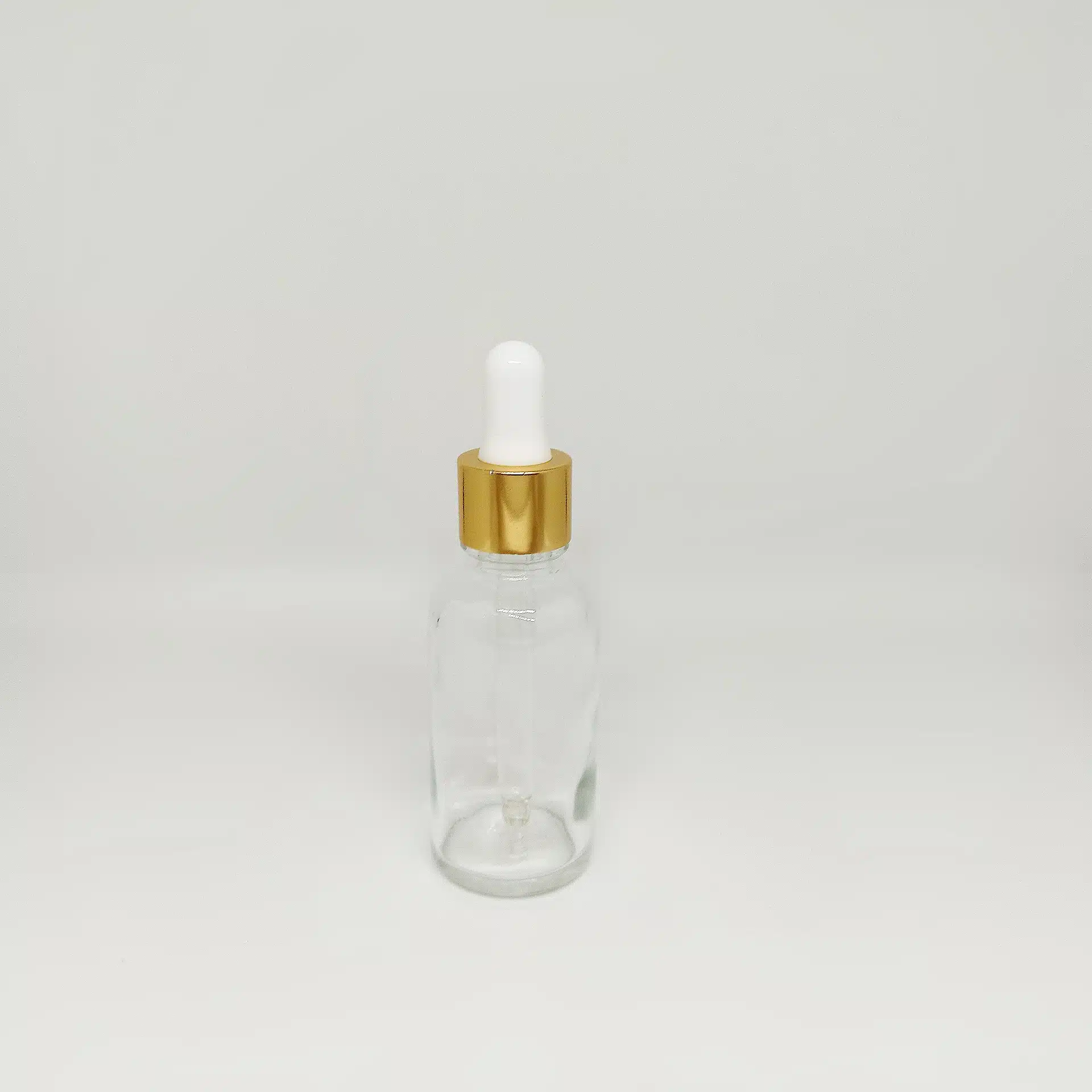 شیشه قطره ۳۰ شفاف با قطره چکان سفید طلایی وارداتی و میله قطره